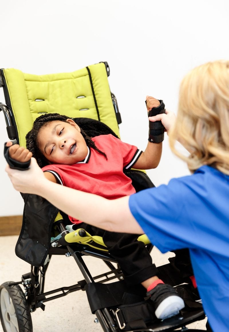 therapy with a child in a wheelchair