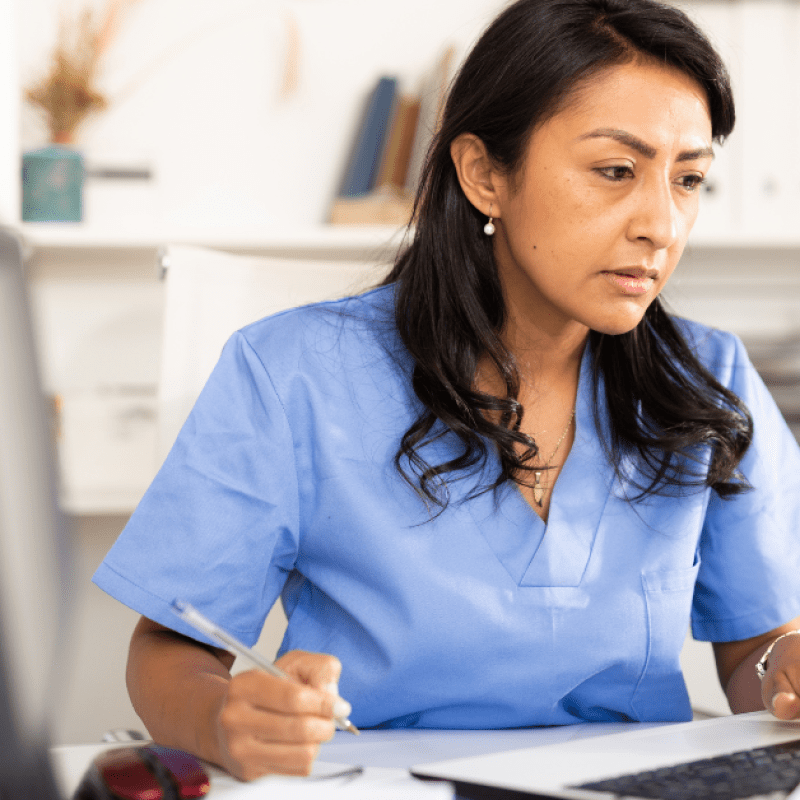 nurse on the computer "Continuing Education as a Pediatric Home Care Nurse"